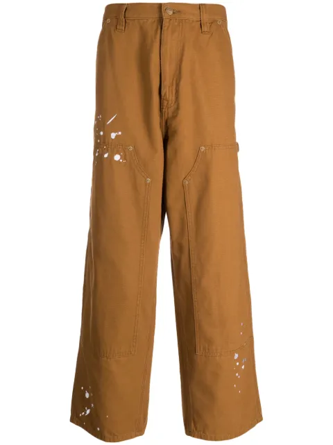 izzue paint-splatter straight trousers