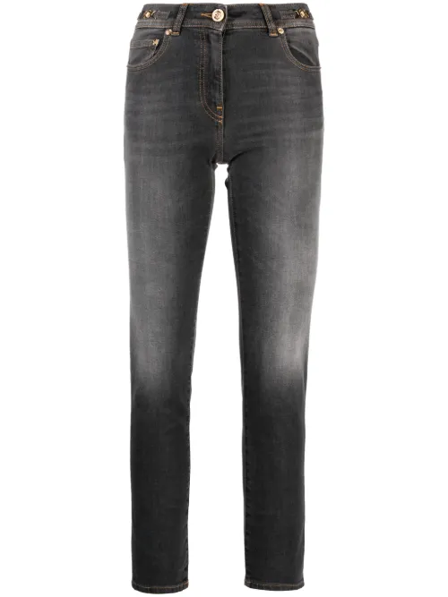 Jean skinny à effet délavé - Versace - Modalova