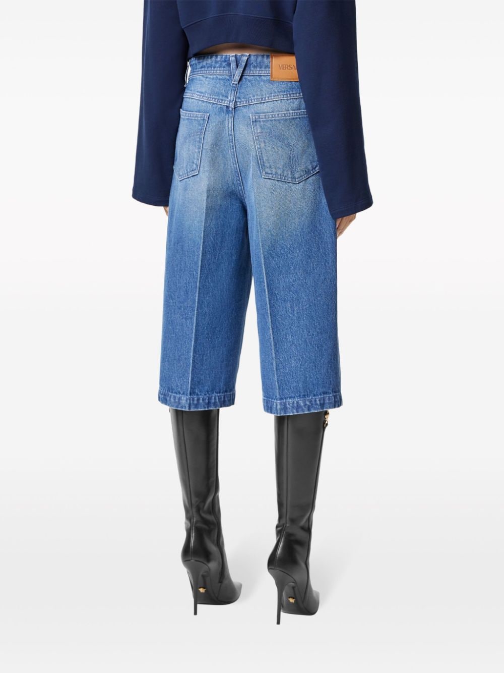 Shop Versace Pressed-crease Cotton Denim Shorts In Blue