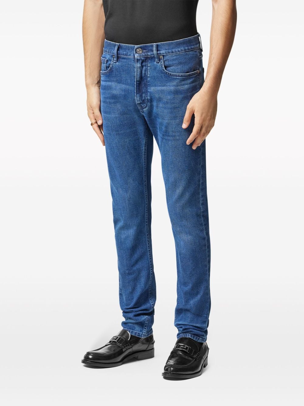 Shop Versace Medusa-embroidered Slim-cut Jeans In Blue