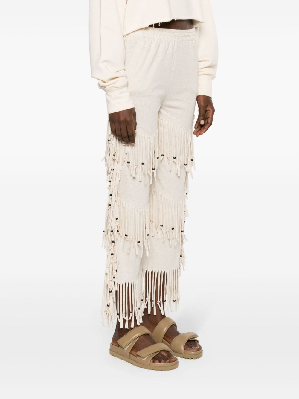 Shop Alanui Monsoon Fringed Trousers In Nude
