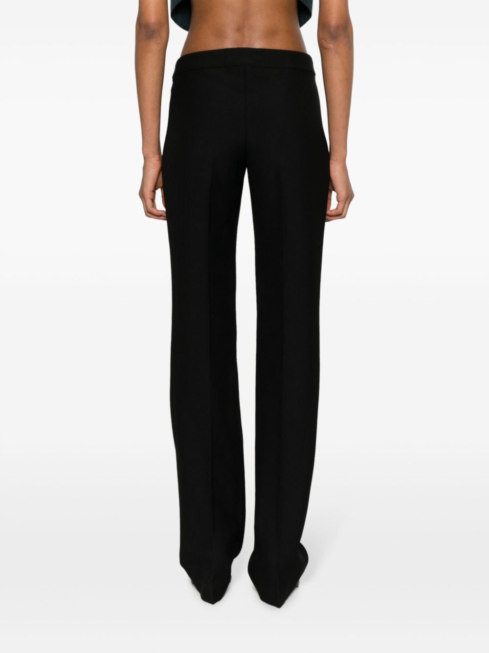 Shop Stella Mccartney Low-rise Wool Slim Trousers In Black