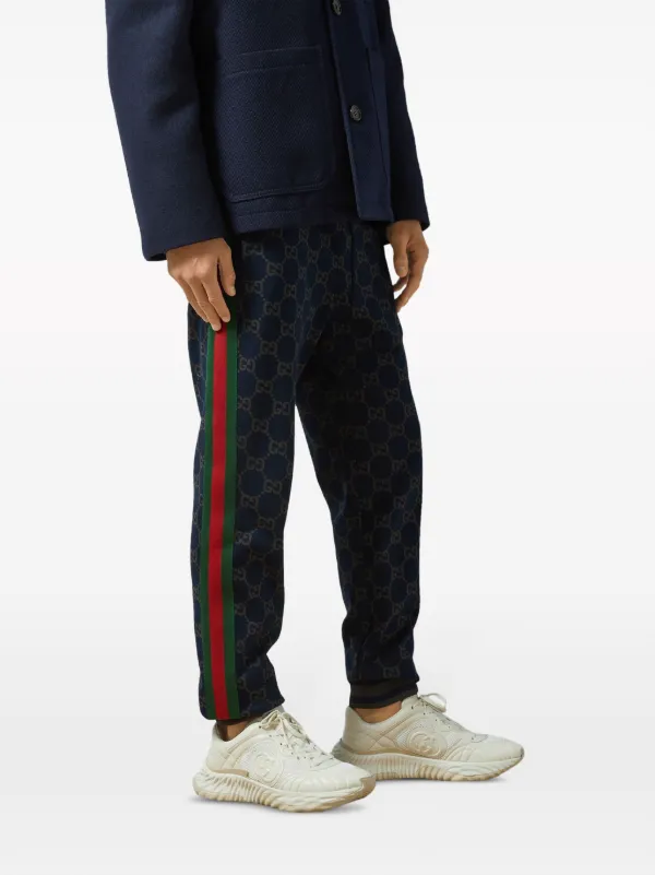 Gucci all-over GG-print Trousers - Farfetch