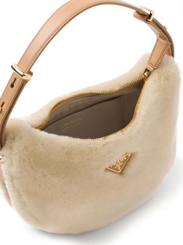 Prada Arqué Shearling Shoulder Bag | Neutrals | FARFETCH