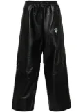 Doublet crocodile-pattern leather track pants - Black