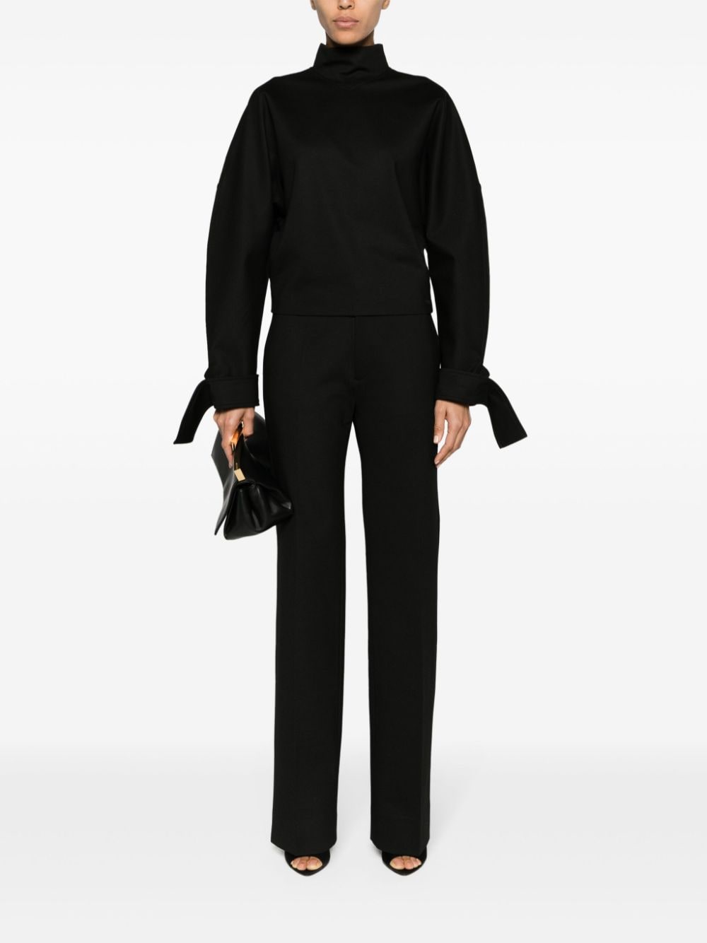 Shop Victoria Beckham Strap-embellished Jersey Top In Black