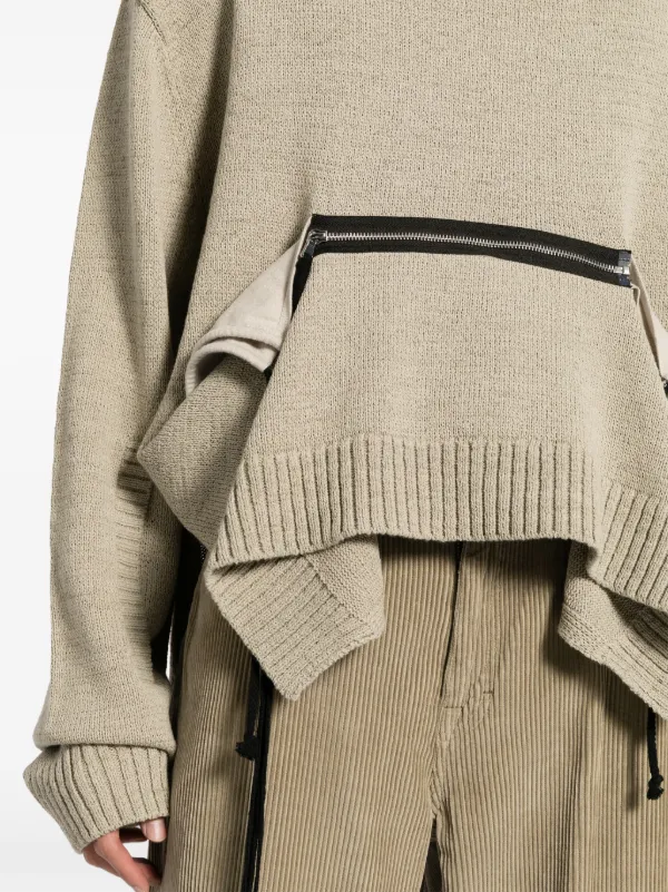 Jumper with zip clearance pockets