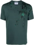 Moschino paint-splatter logo-print T-shirt - Green
