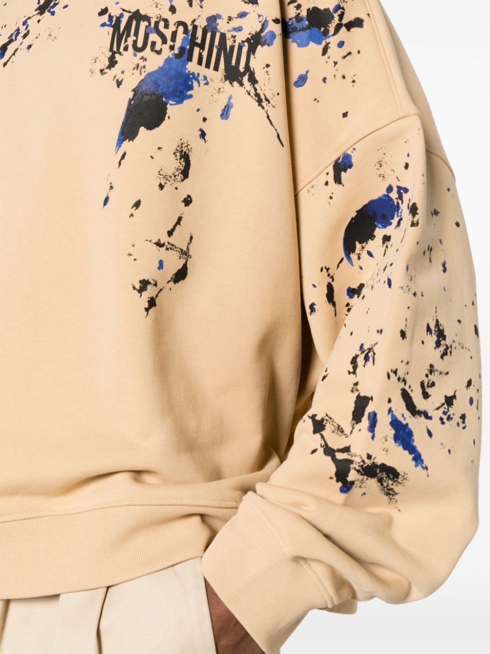 Shop Moschino Paint-splatter Logo-print Sweatshirt In Neutrals