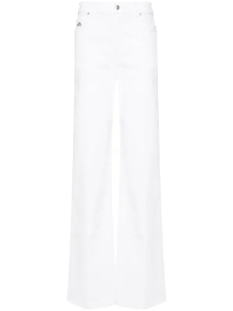 Alexander McQueen jeans con placa del logo