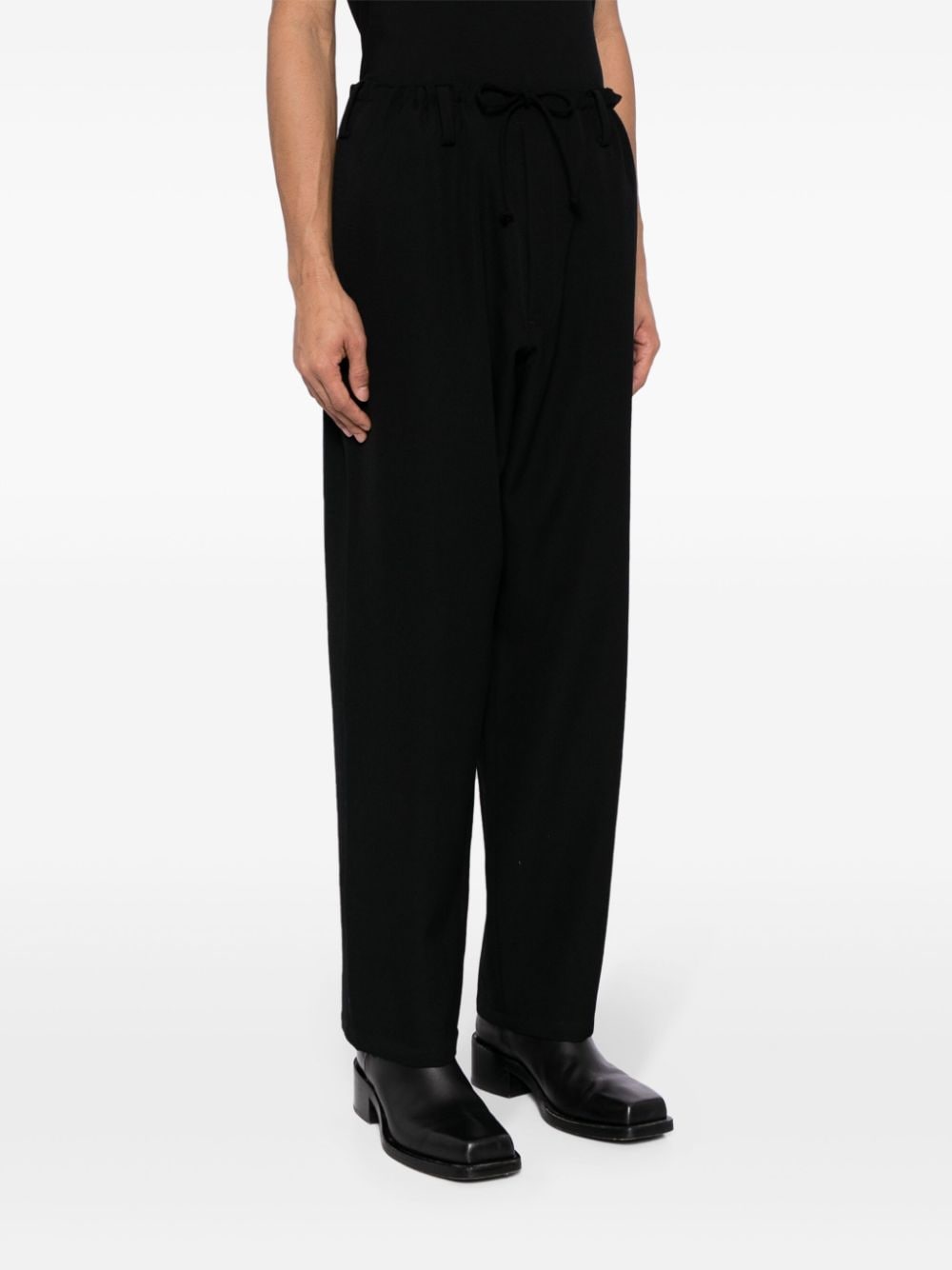 Shop Yohji Yamamoto Logo-appliqué Wool Trousers In Black