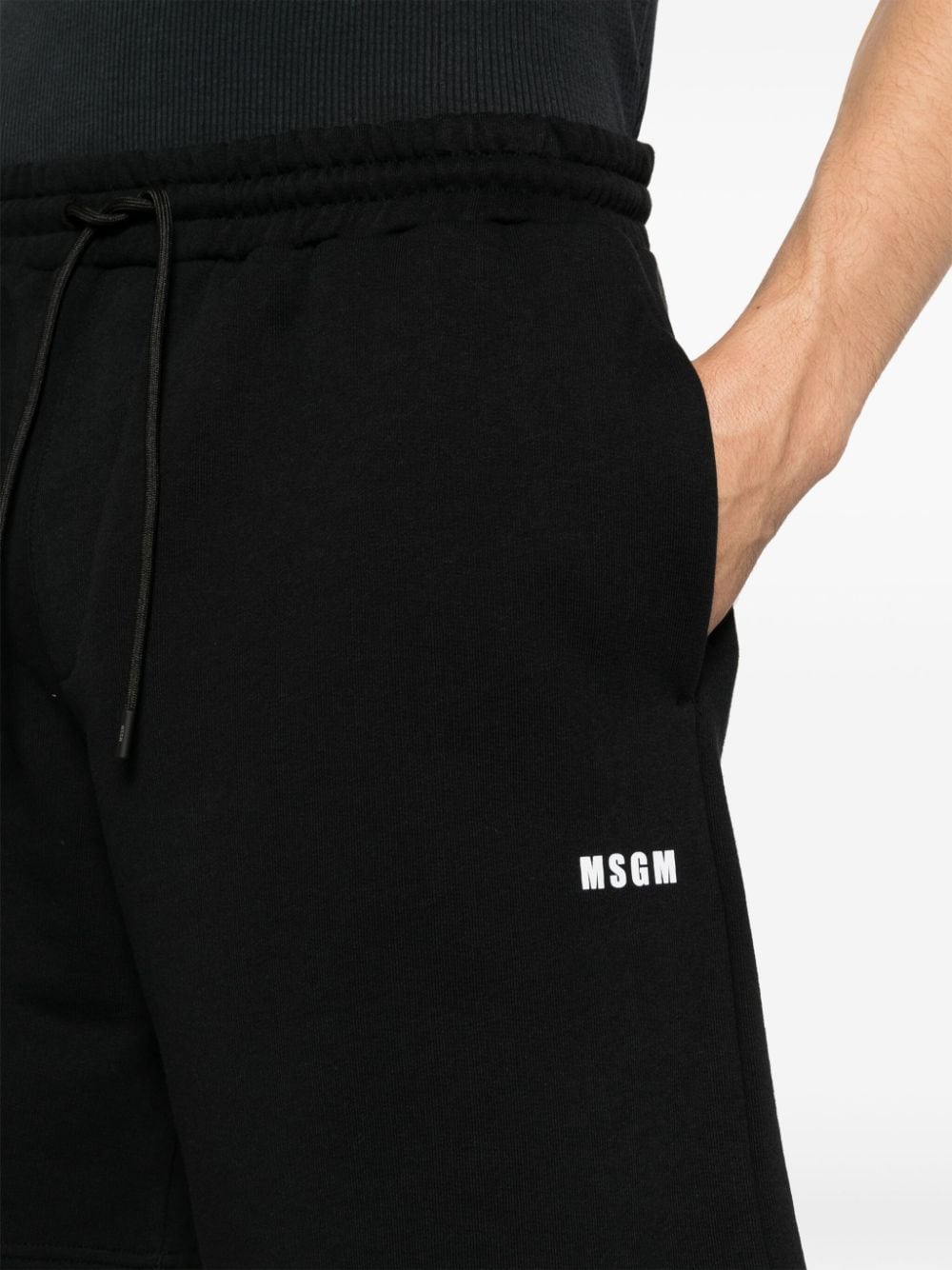 Shop Msgm Logo-print Cotton Track Shorts In Black