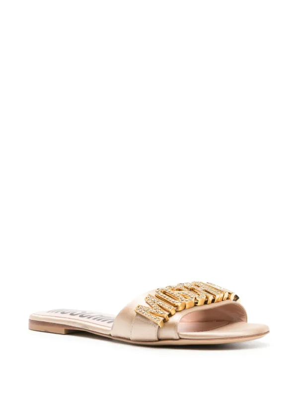 Moschino logo-plaque Sandals | Gold | FARFETCH