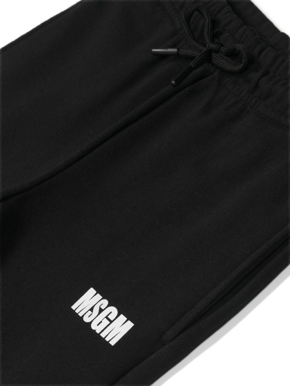 Shop Msgm Logo Print Cotton Trousers In Black
