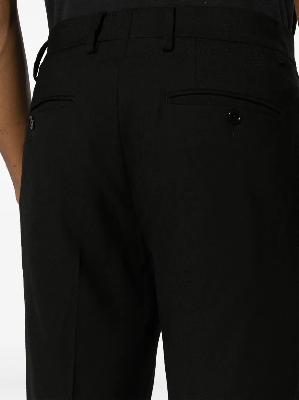 Shop Moschino Tapered-leg Tailored Trousers In Black