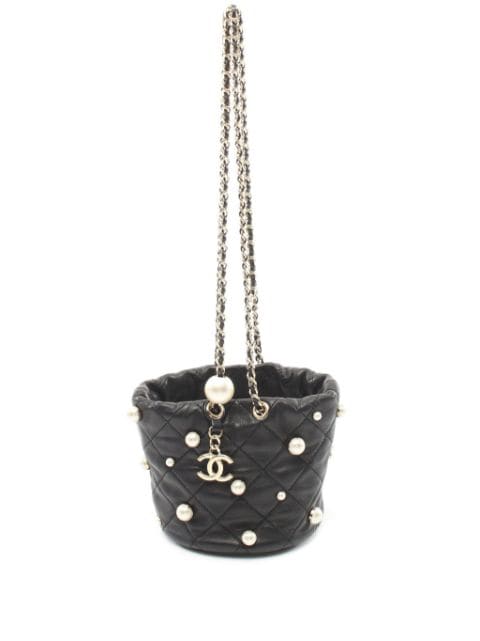 CHANEL Pre-Owned 2021 diamond-quilted faux-pearl embellished bucket bag