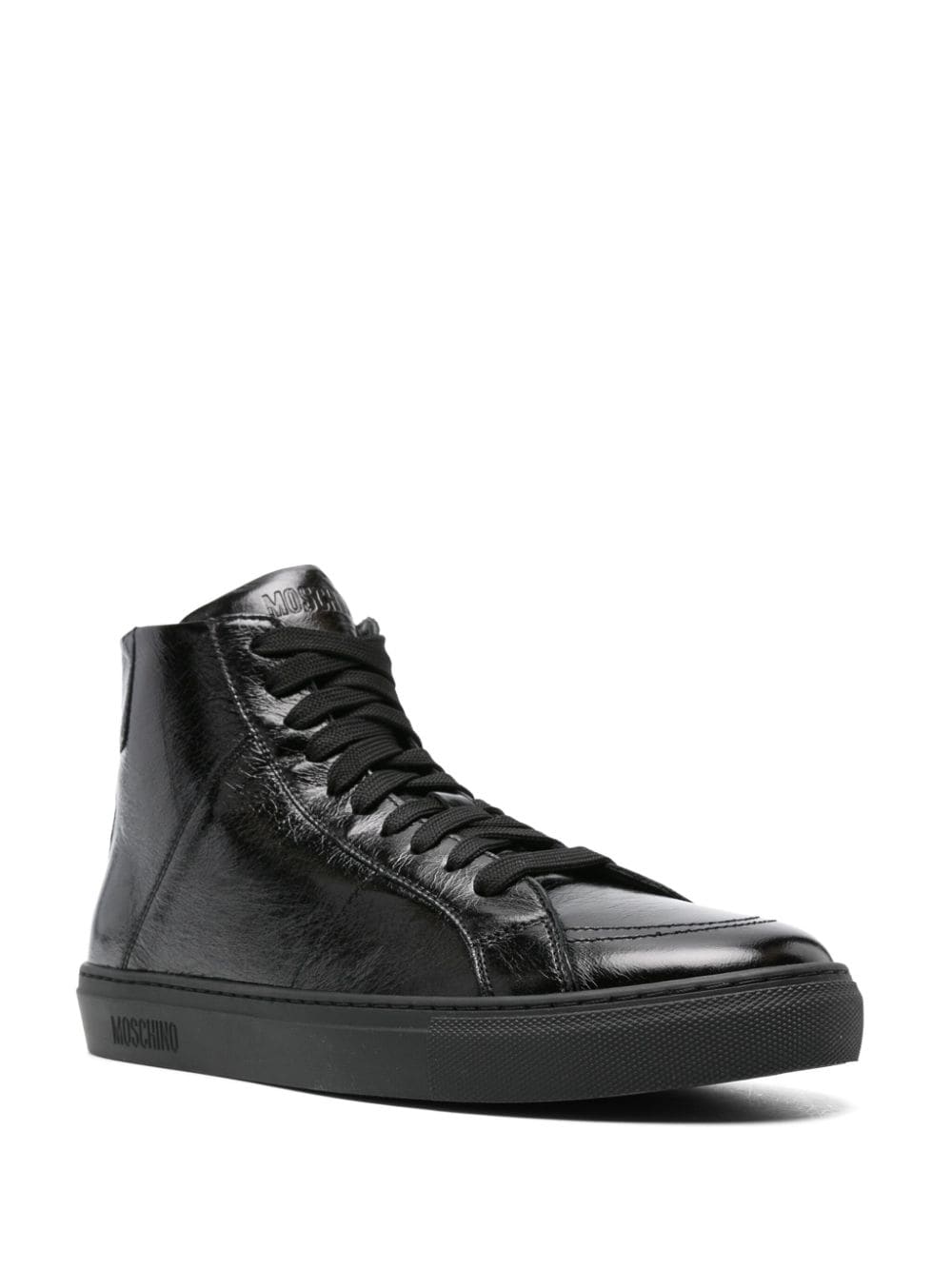 Shop Moschino Crinkled Leather Sneakers In Black