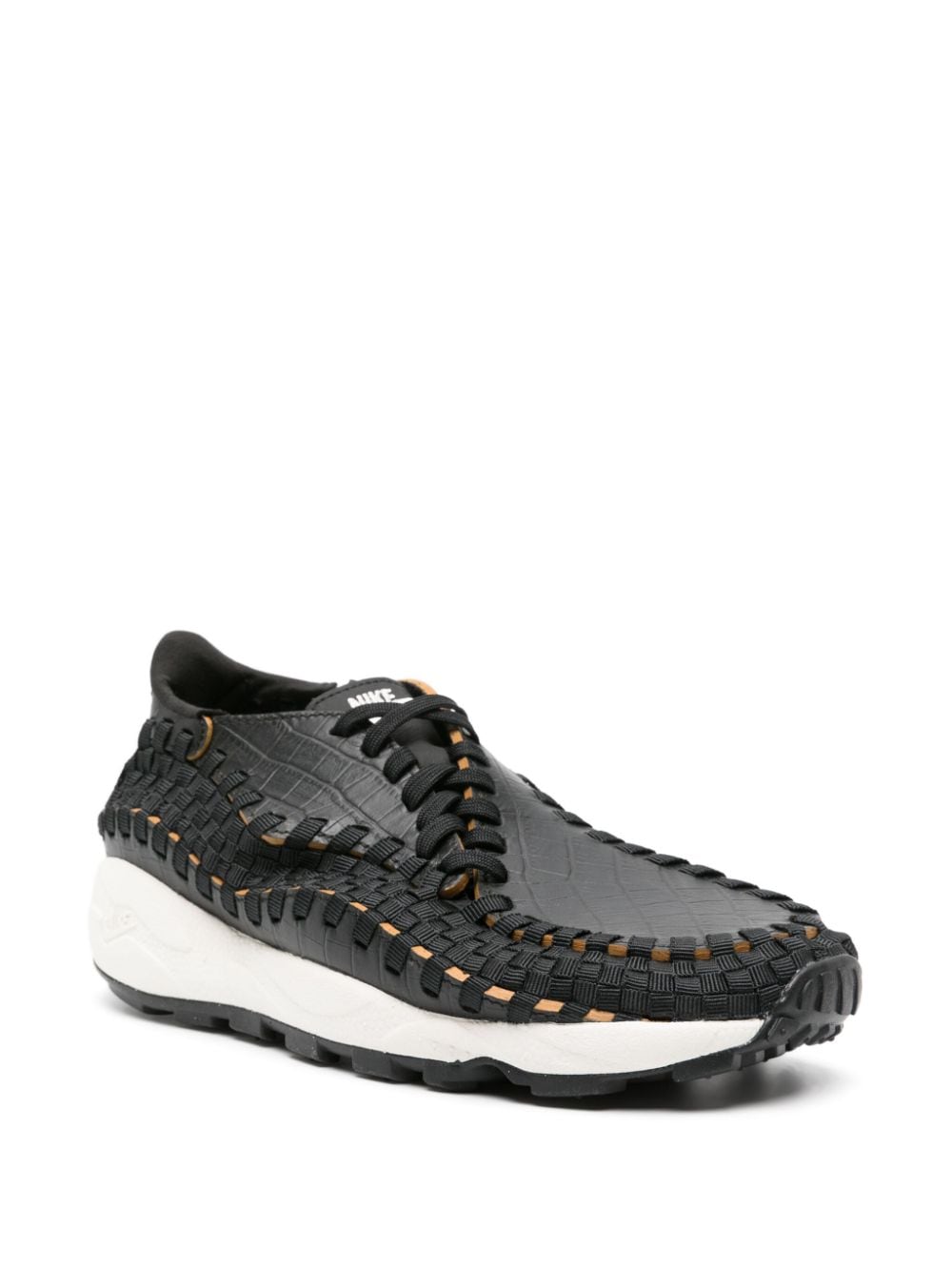 Shop Nike Air Footscape Woven Leather Sneakers In Black