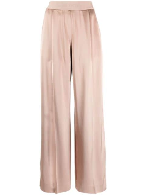 Stine Goya Ciara logo-waistband satin trousers