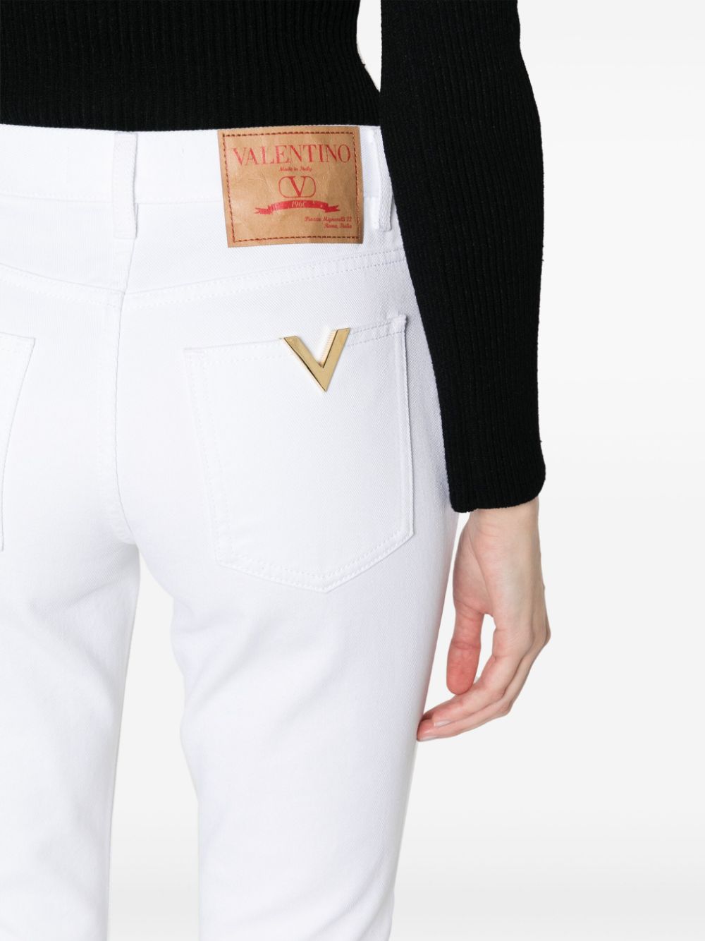 Shop Valentino Mid-rise Bootcut Jeans In White