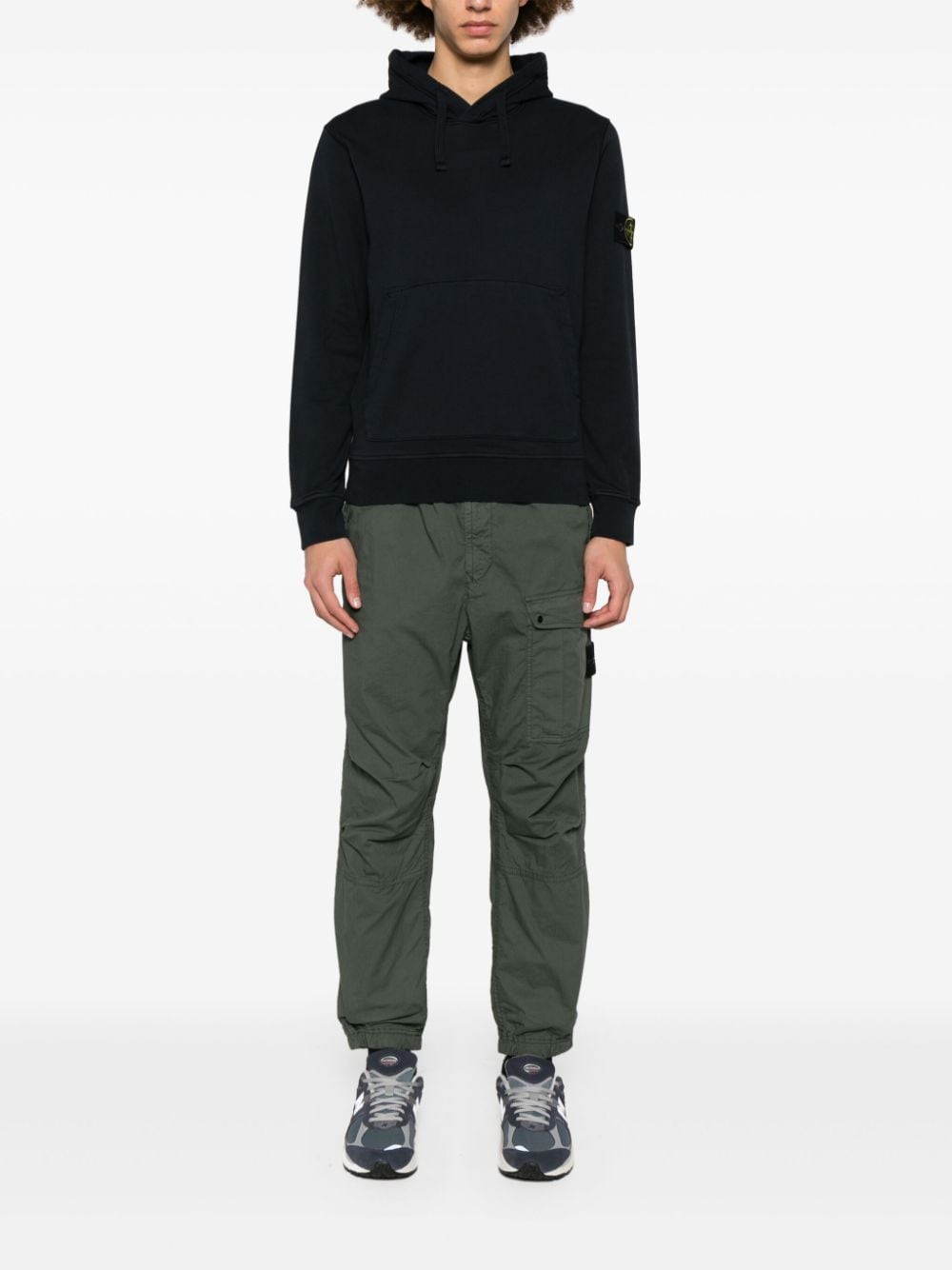 Shop Stone Island Compass-badge Tapered-leg Trousers In Green