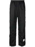 Thom Browne logo-patch sheer-ripstop track pants - Blue