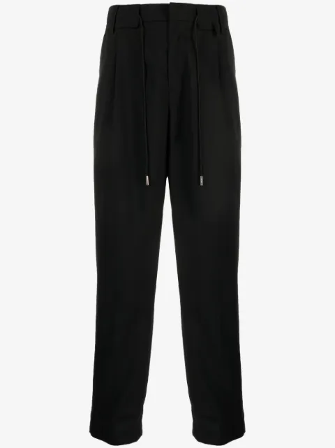 sacai pantalones tapered con cordones en la pretina