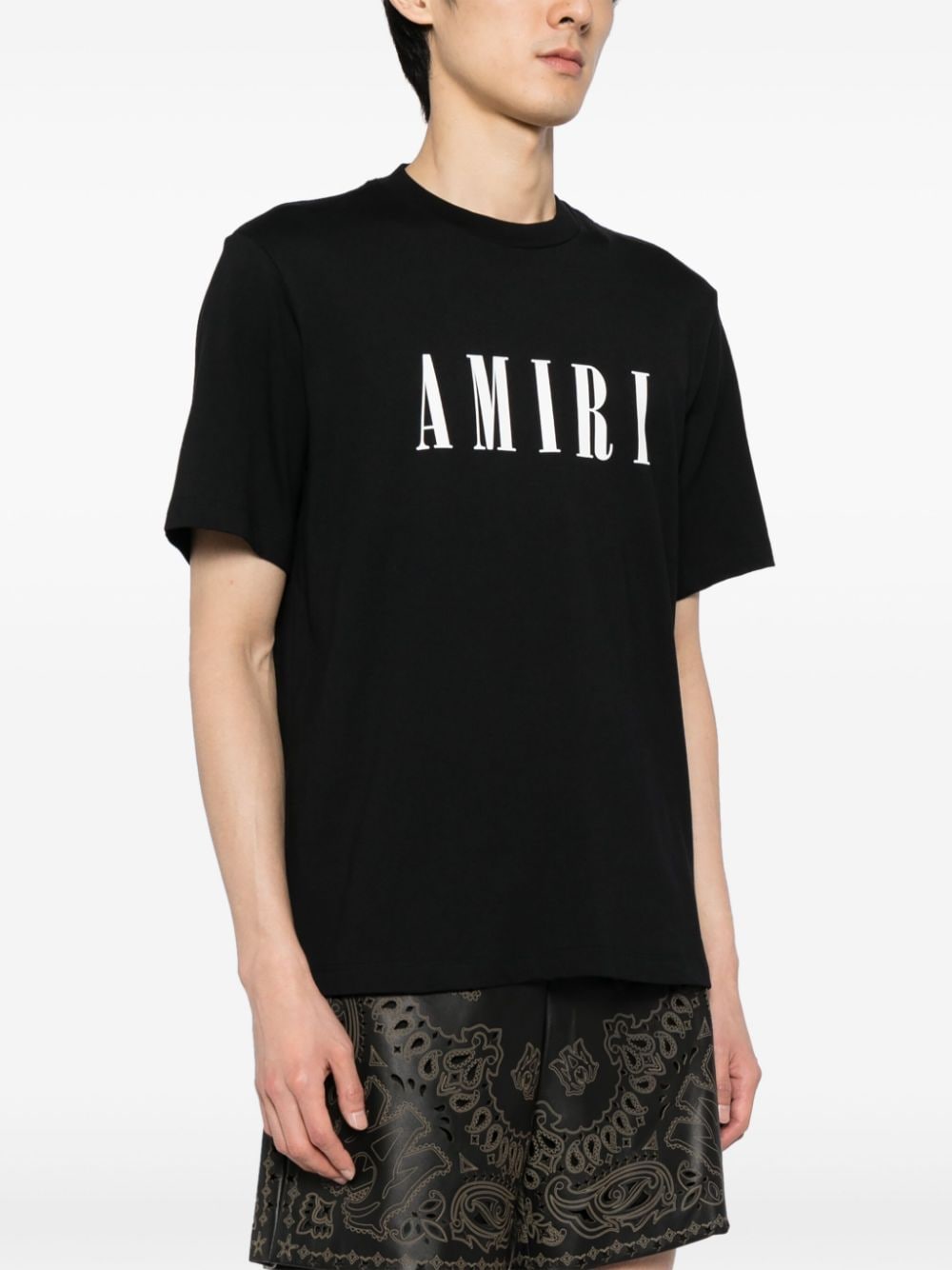 Shop Amiri Logo-print Cotton T-shirt In Black