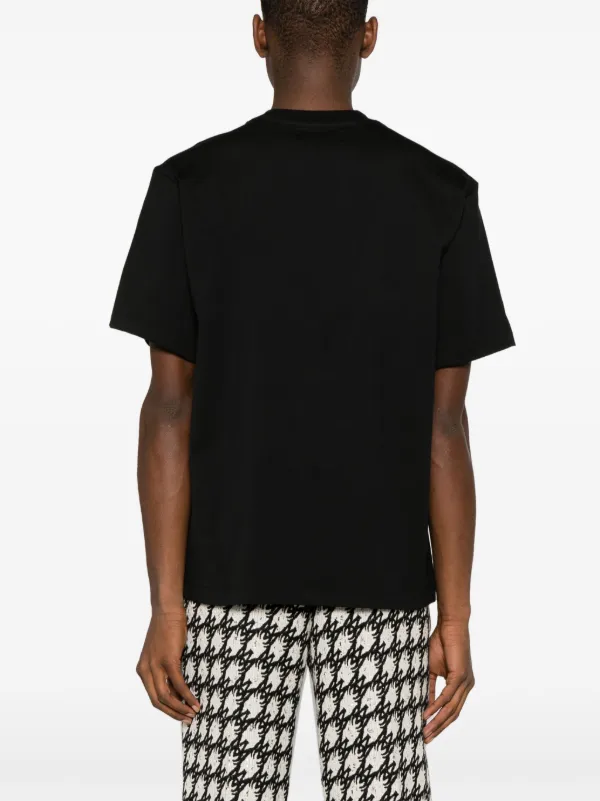 AMIRI Staggered logo-appliqué T-shirt | Black | FARFETCH