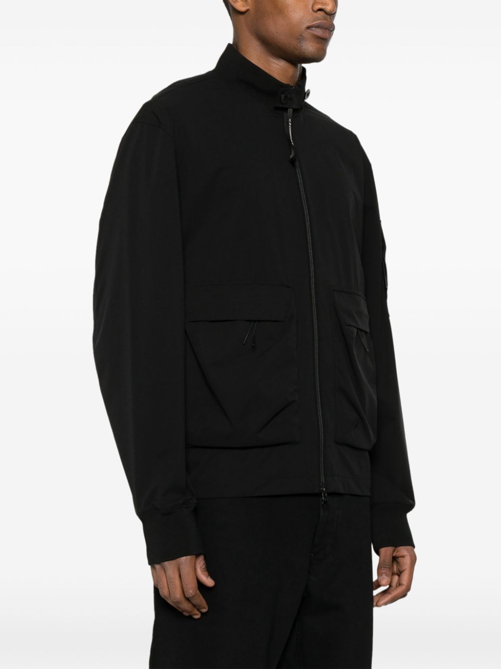 Shop C.p. Company Lens-appliqué Bomber Jacket In Schwarz