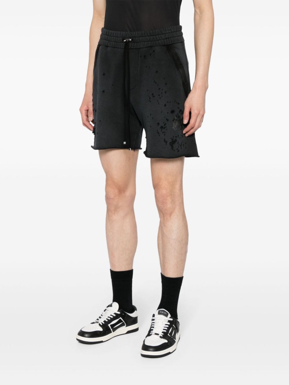 Shop Amiri Shotgun Distressed Shorts In Black