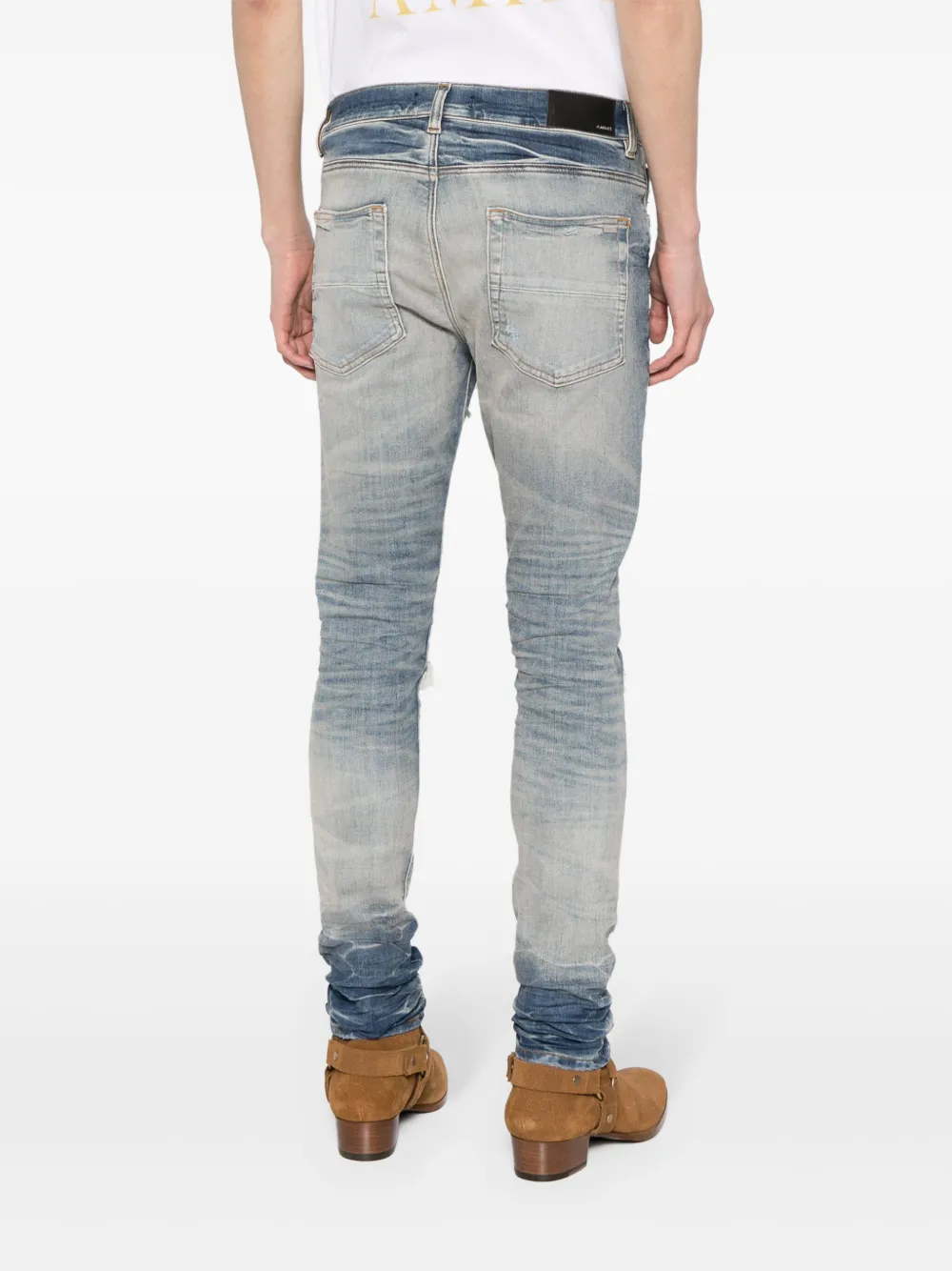 distressed slim-cut jeans