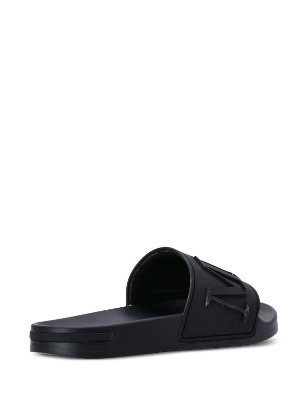 Mallet logo embossed open toe Slides Farfetch