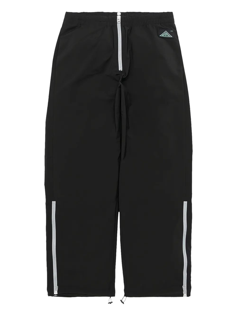 OAMC zip-detail panelled track pants | Black | Image 1