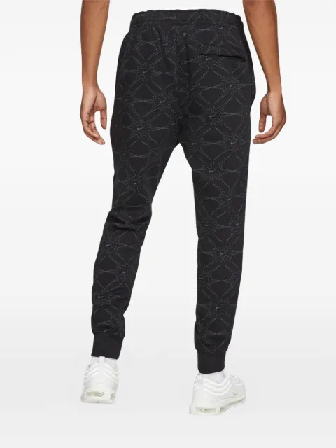 Nike pantalones joggers Club estampados