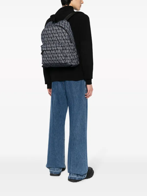 Valentino Garavani monogram-pattern Zipped Backpack | Blue
