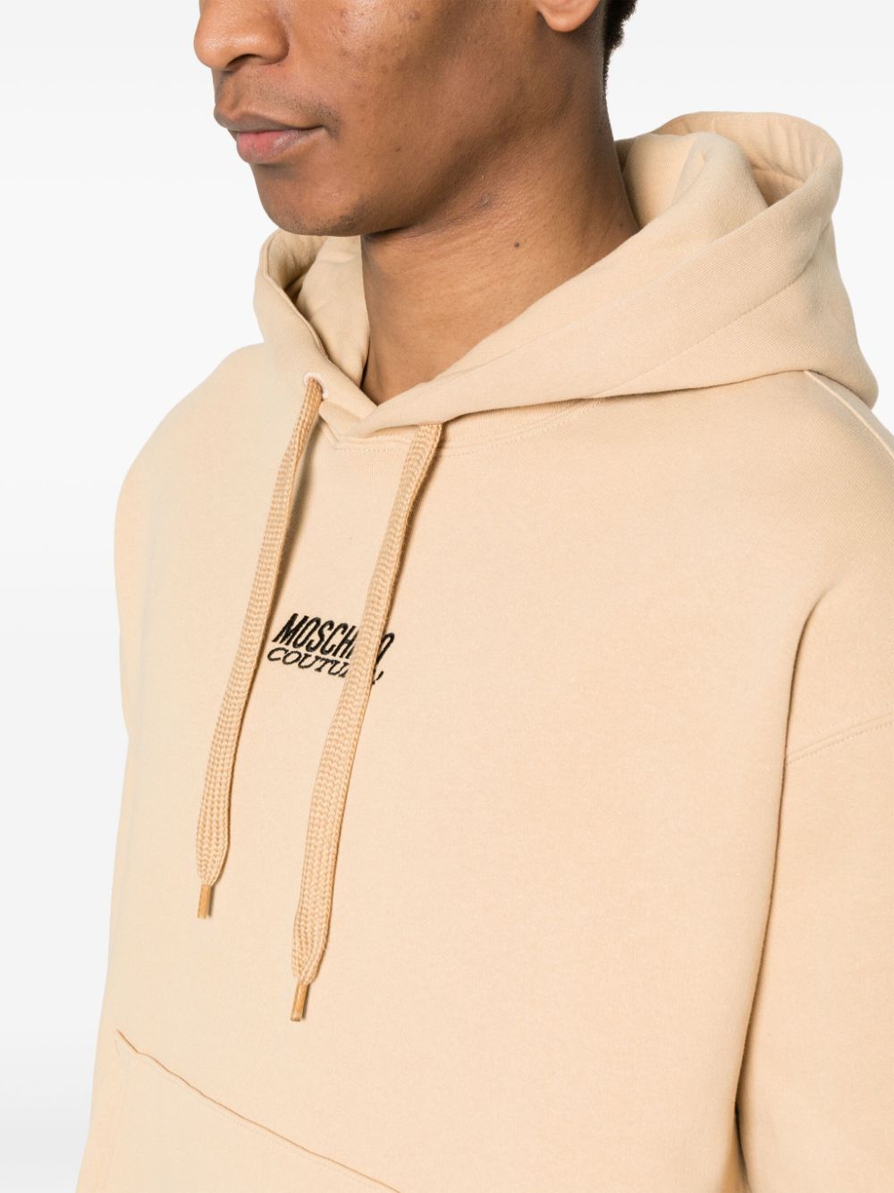 Shop Moschino Logo-embroidered Hoodie In Neutrals