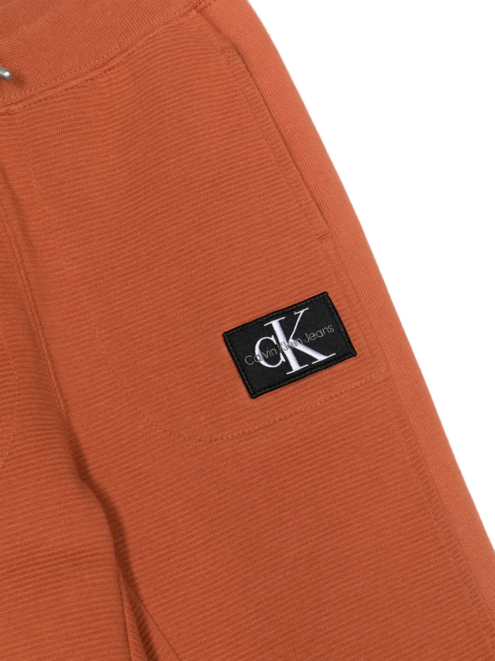 Calvin Klein Kids Trainingsbroek met logopatch Oranje