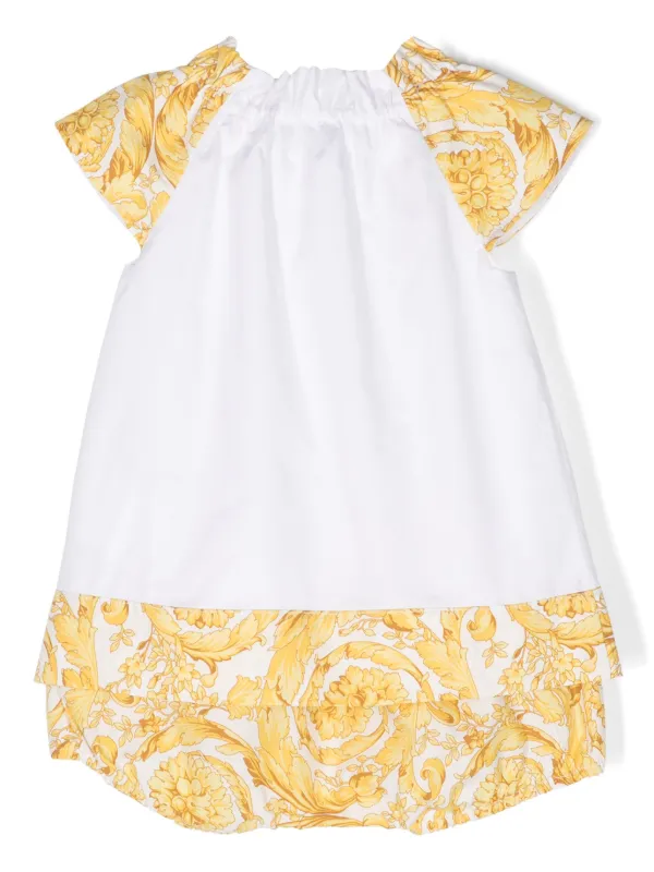 Iconic dress hotsell white and gold