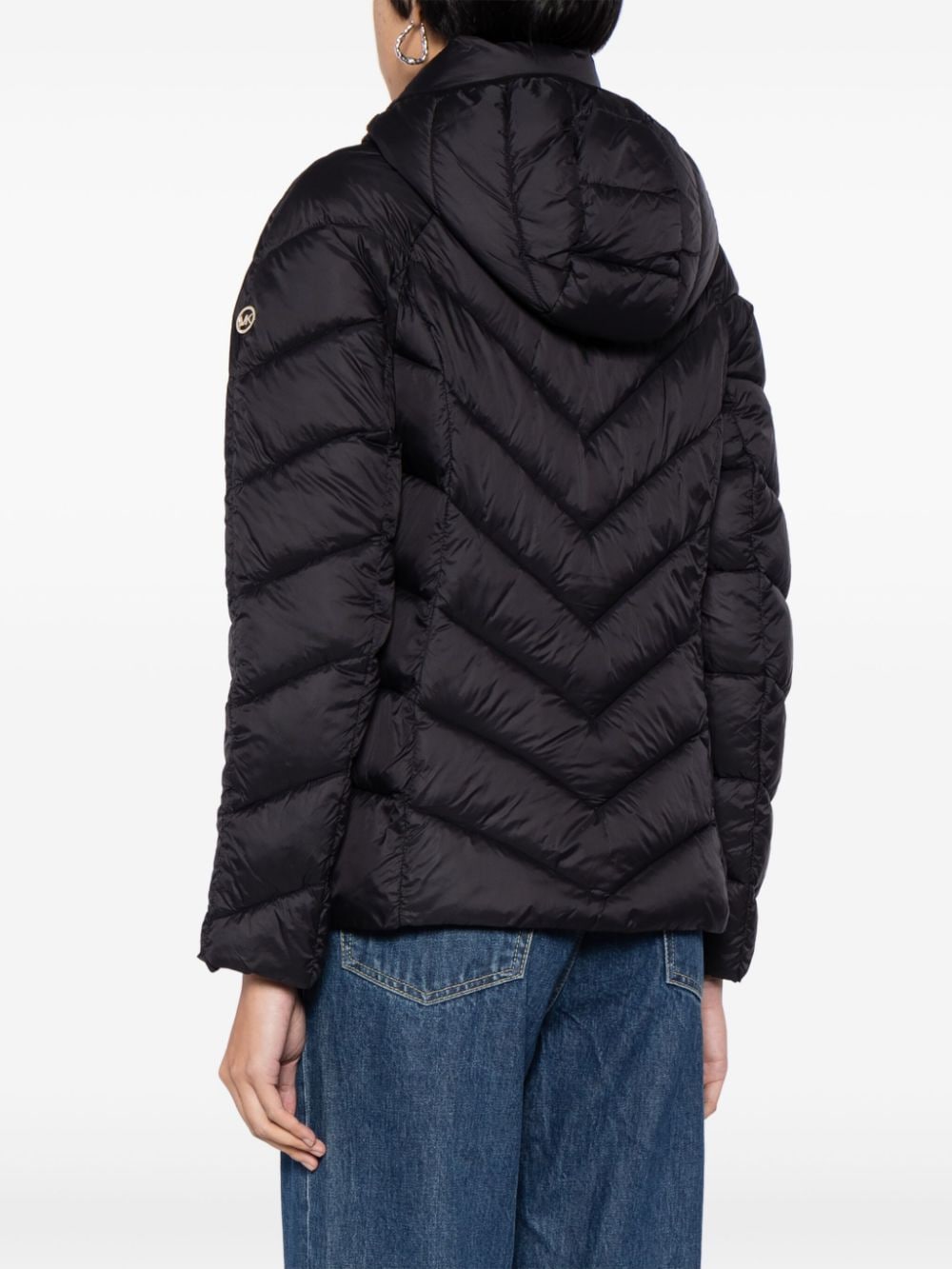 Shop Michael Michael Kors Chevron-quilted Puffer Jacket In Black