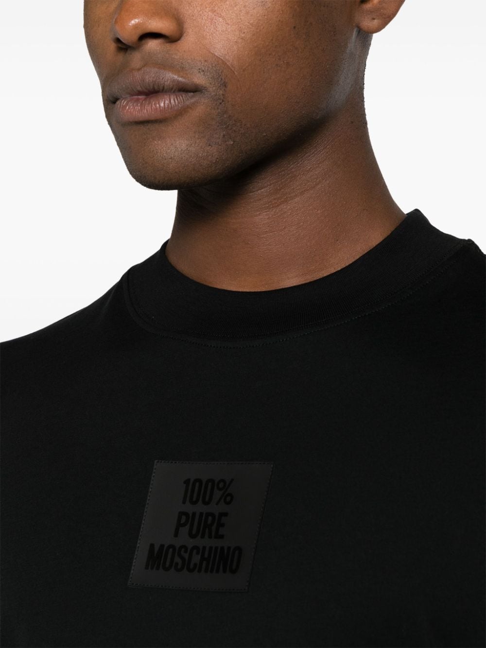 Shop Moschino Logo-patch Cotton T-shirt In Black