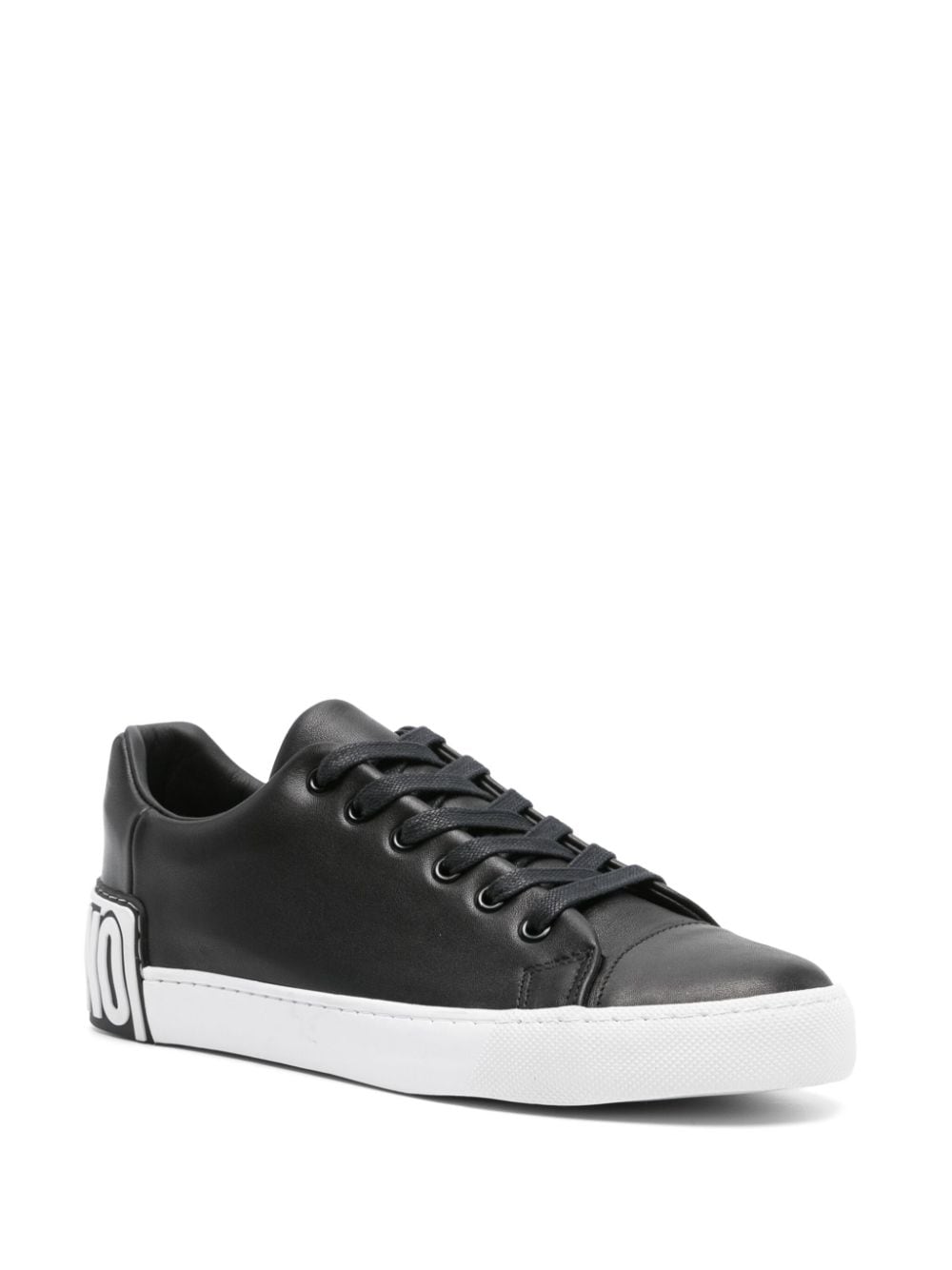 Shop Moschino Embossed-logo Leather Trainers In Black