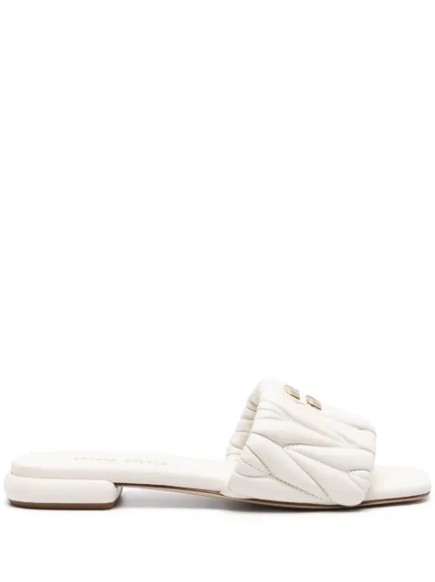 Miu Miu logo-lettering matelassé slides
