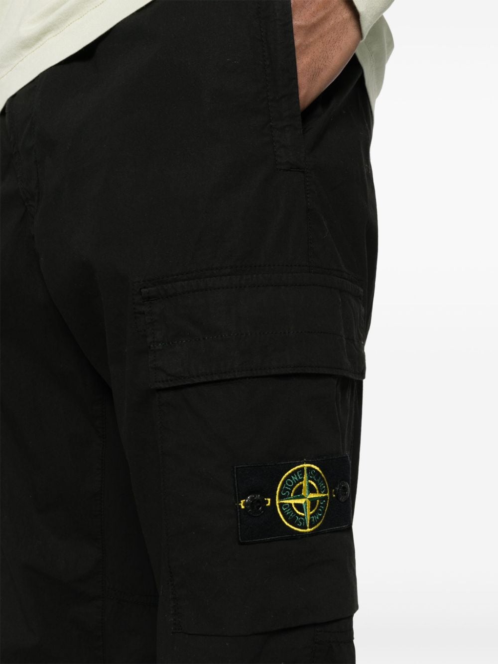 Shop Stone Island Tapered Cargo Pants In Black