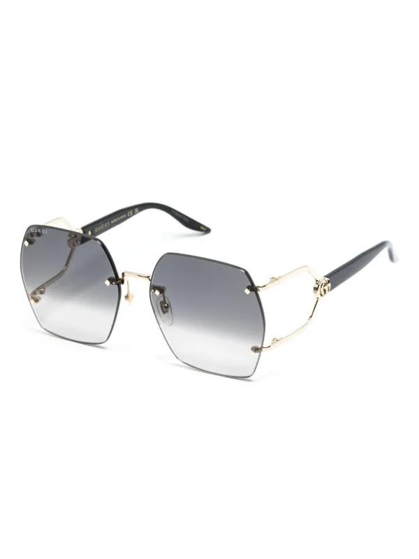 Gucci Eyewear geometric lenses Rimless Sunglasses Farfetch