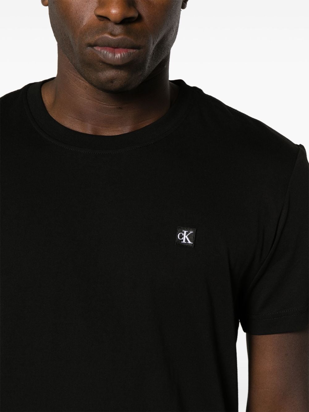 Shop Calvin Klein Logo-patch Cotton T-shirt In Black