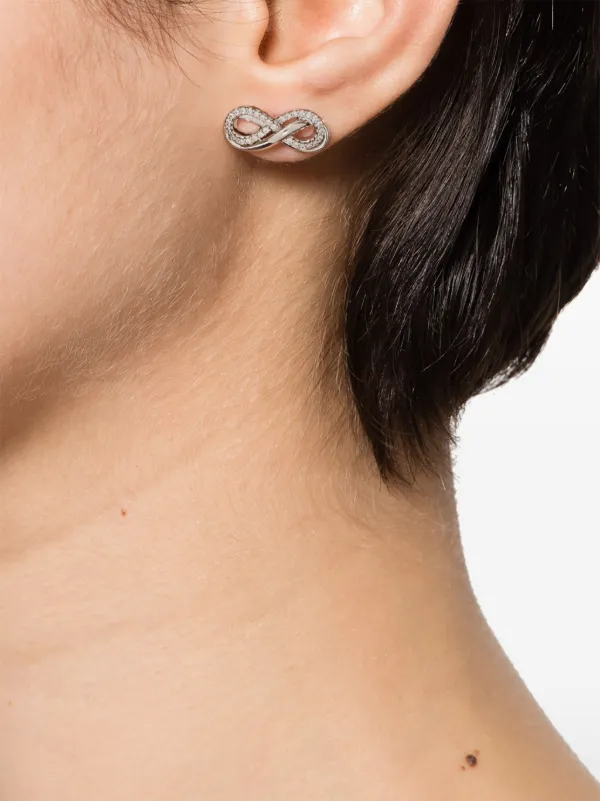 Swarovski Hyperbola ピアス | ホワイト | FARFETCH JP