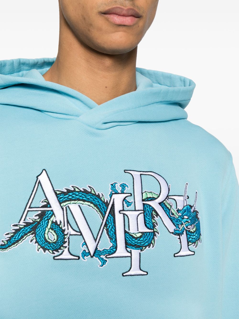 Shop Amiri Logo-embroidered Cotton Hoodie In Blue