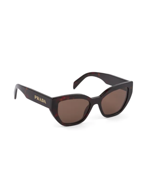 Prada Eyewear cat eye tortoiseshell effect Sunglasses Brown FARFETCH AU