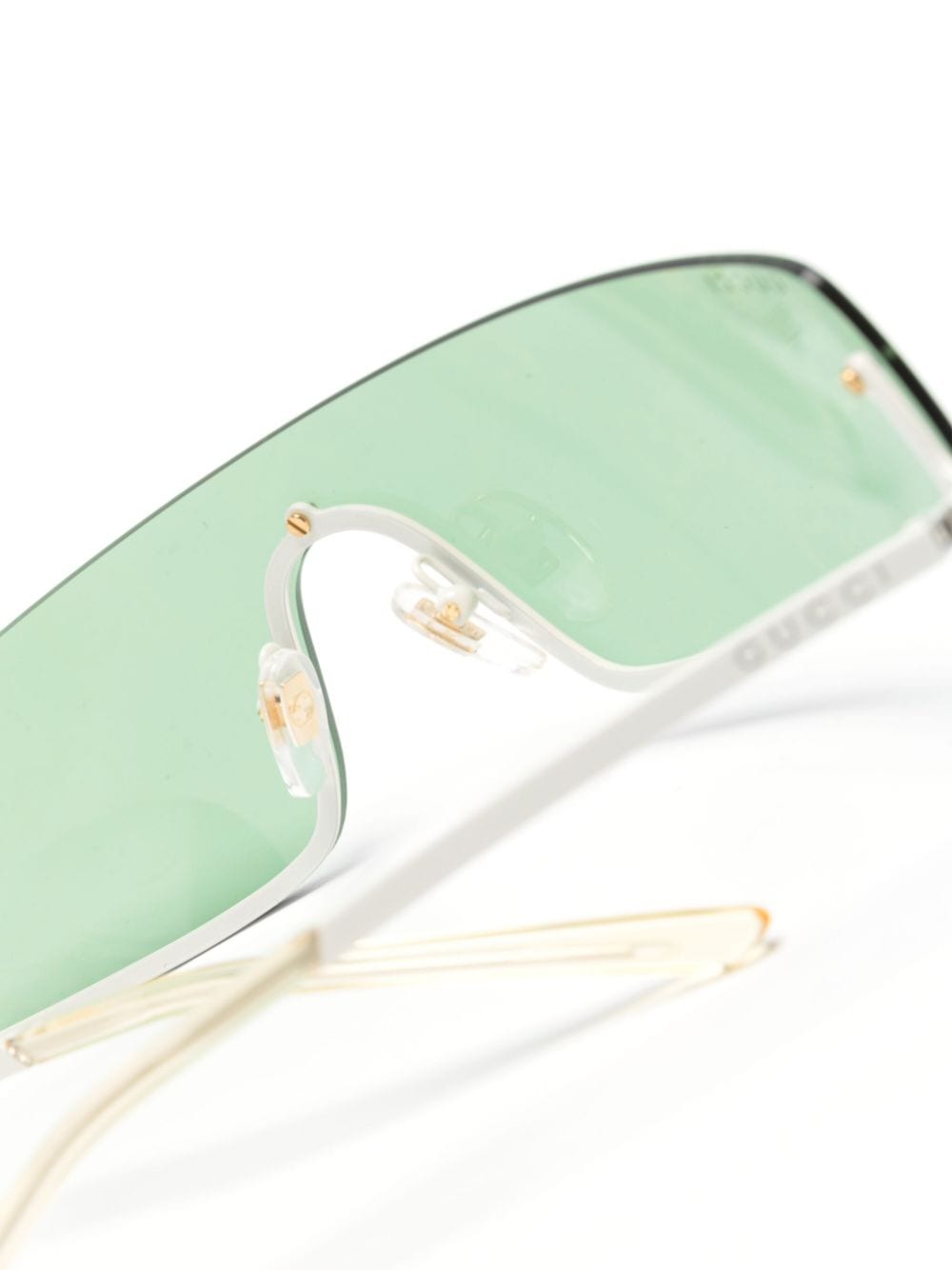 Gucci Eyewear Zonnebril met schild montuur en vierkant G patroon Groen